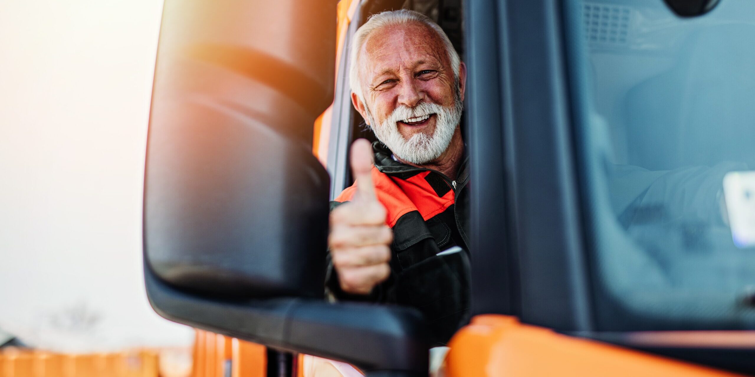 Senior,Garbage,Removal,Worker,Driving,A,Waste,Truck.